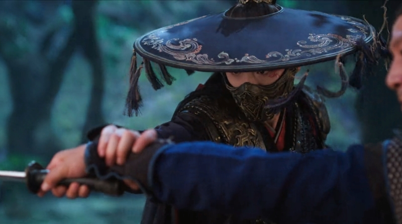 A scene from Chinese period drama, A Dream Within a Dream episode 6 recap of a man with mask and hat fending off a blade attack