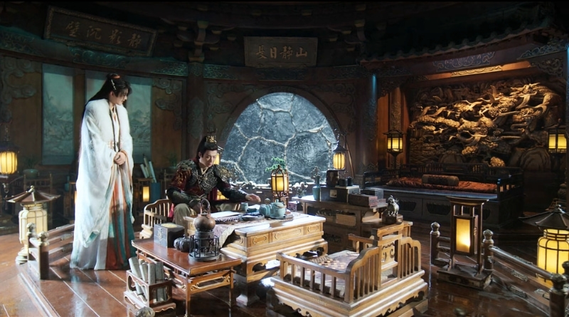 A scene from Chinese period drama, A Dream Within a Dream episode 7 recap of 2 men conversing in in a beautiful room with ancient chinese furniture