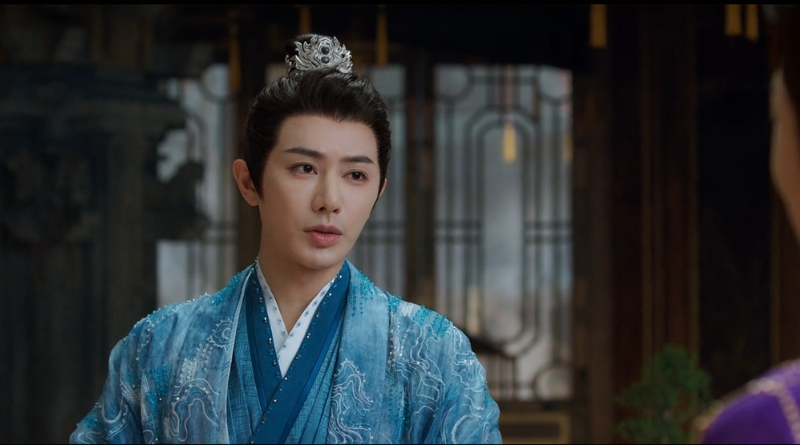 A scene from Chinese period drama, A Dream Within a Dream episode 8 recap of man in blue talking