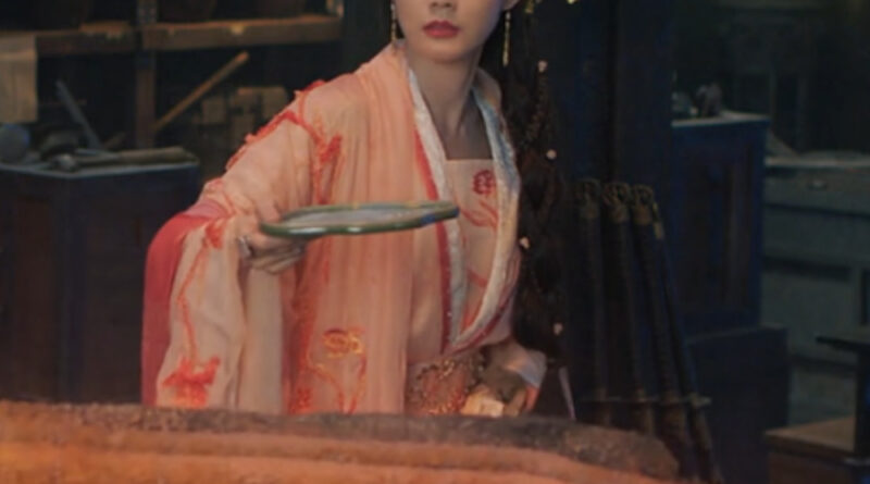 A scene from A Dream Within A Dream Chinese period drama of a women working with molten fire