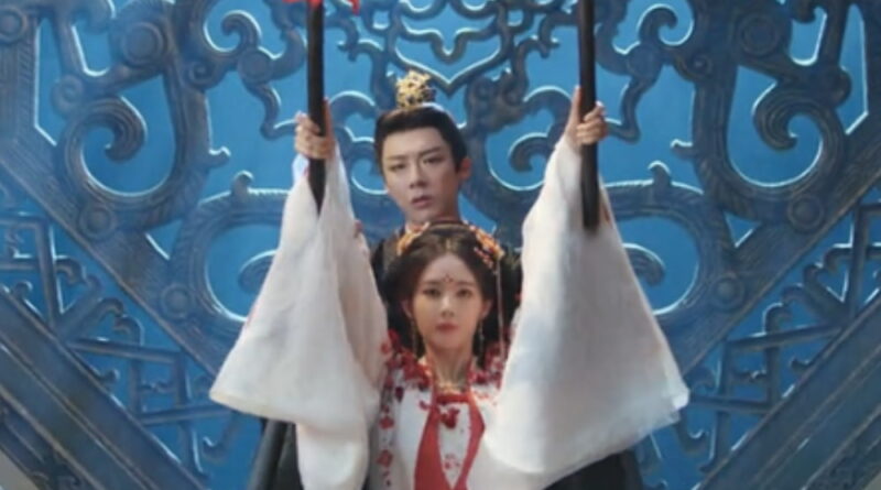A scene from A Dream Within A Dream Chinese period drama of man and woman drumming battled drums together