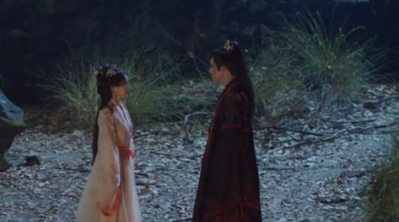 A scene from A Dream Within A Dream Chinese period drama of a couple talking outside near a bonfire