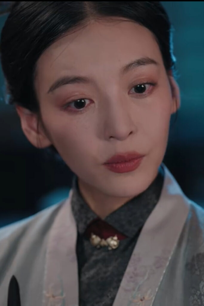 Scene from period Chinese drama The Road To Splendor Episode 12 recap and review of a woman in a beige and green hanfu