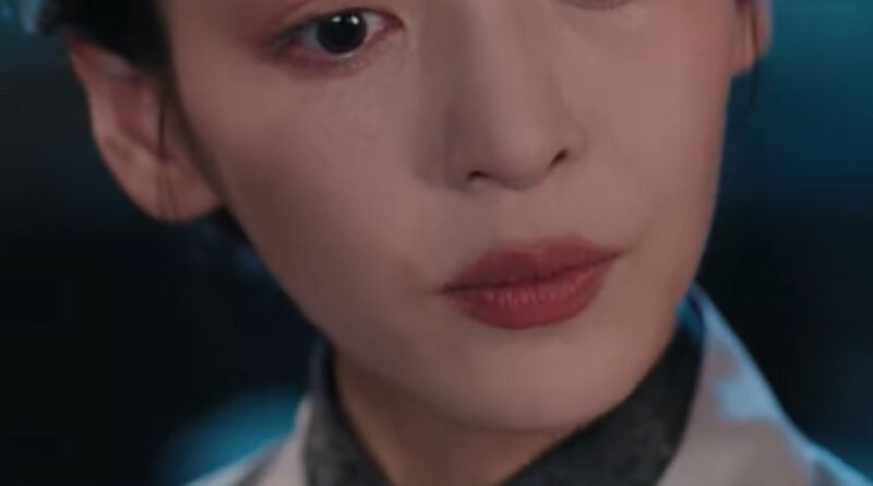 Scene from period Chinese drama The Road To Splendor Episode 12 recap and review of a woman in a beige and green hanfu