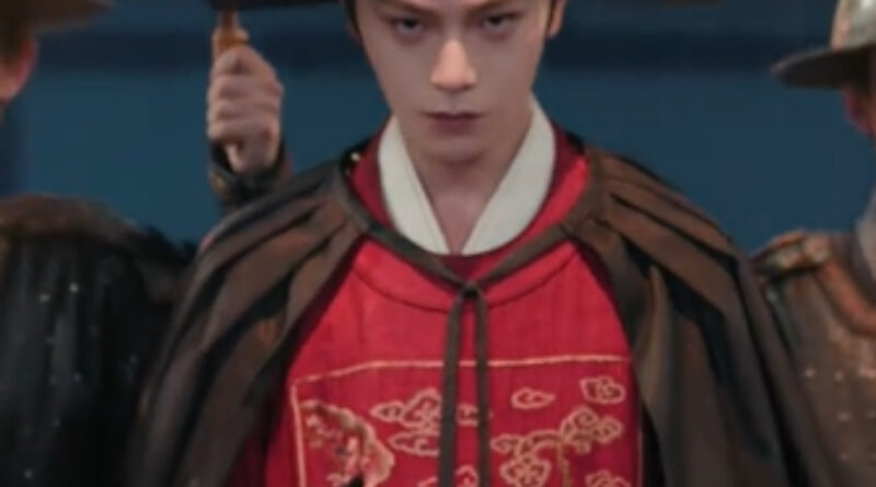 Scene from period Chinese drama The Road To Splendor Episode 18 recap and review of a man in imperial robes with gloves
