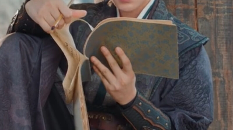 Scene from period Chinese drama The Road To Splendor Episode 8 recap and review of a man writing in a book