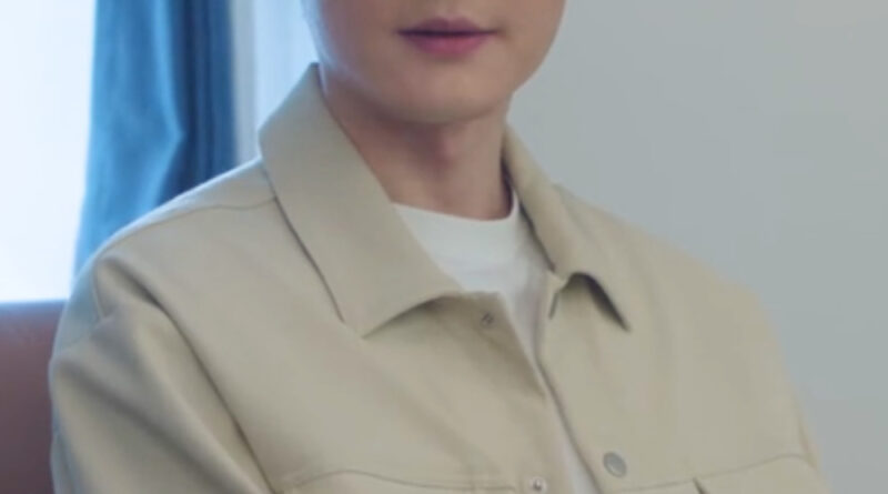 Scene from modern Chinese drama Road To Success Episodes 19-20 recap of a man in a beige jacket holding a pen and writing on a notepad