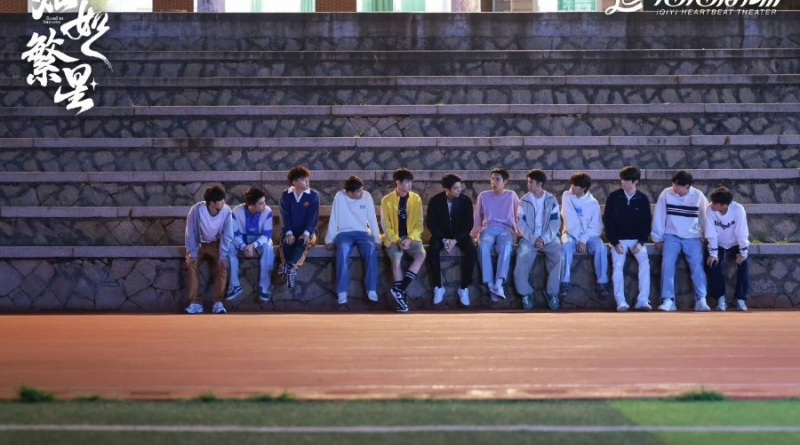 Scene from modern Chinese drama Road To Success Episodes 19-20 recap of a coach talking to his football students at the grandstand at the track field in school