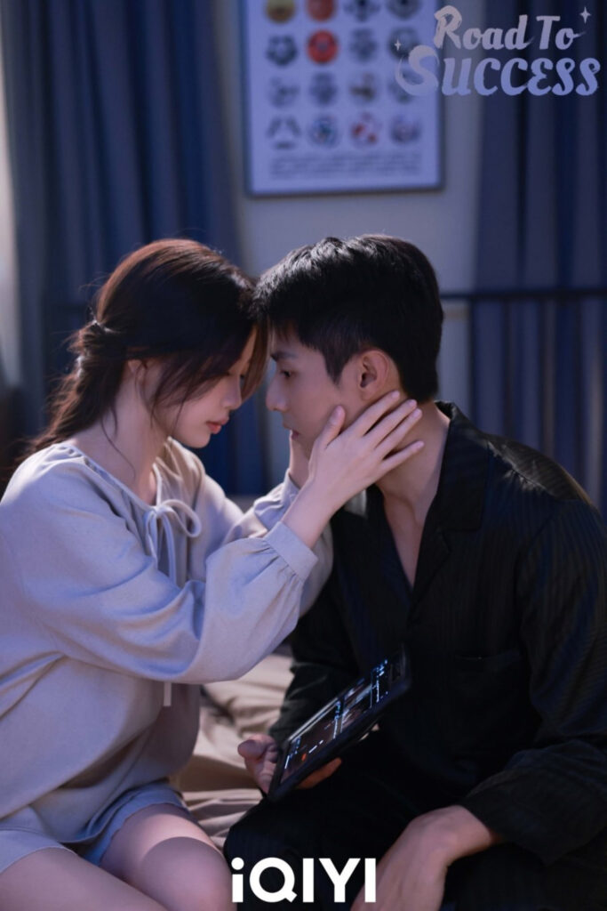 Scene from modern Chinese drama Road To Success romance review of a woman holding a man's forehead to hers