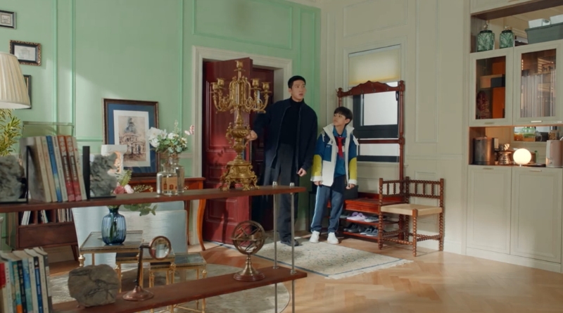 Scene from modern Chinese drama Road Home Episode 10 recap and review of a man and boy walking into an apartment