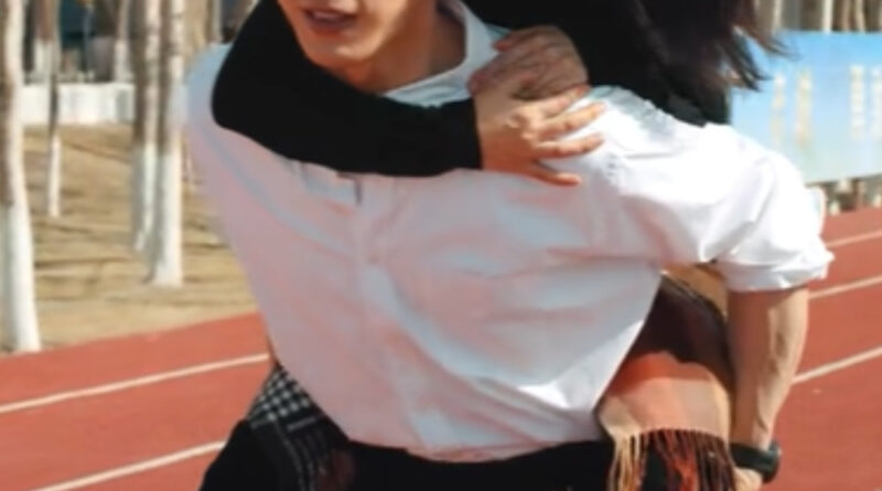 Scene from modern Chinese drama Road Home Episode 13 recap and review of a man piggybacking a woman and running on the track
