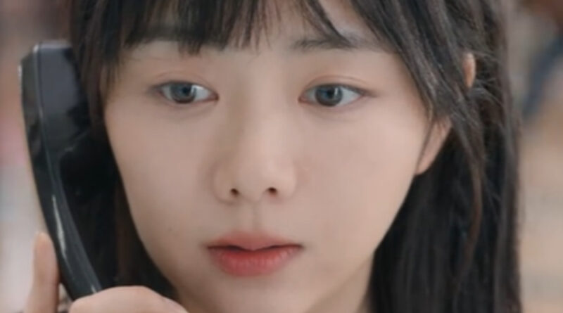 Scene from modern Chinese drama Road Home Episode 16 recap and review of a girl talking on a phone