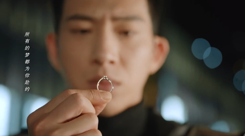 Scene from modern Chinese drama Road Home Episode 17 recap and review of a man looking at a ring