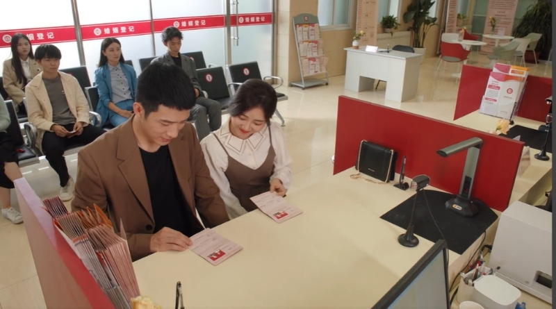 Scene from modern Chinese drama Road Home Episode 20 recap and review of 2 people registering their marriage at the office
