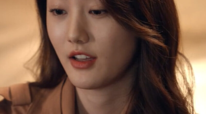 Scene from modern Chinese drama Road Home Episode 22 recap and review of a chinese woman in brown jacket