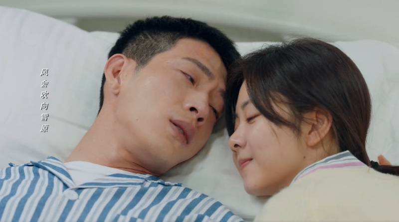 Scene from modern Chinese drama Road Home Episode 27 recap and review of a couple in hospital with wife putting her head near her husband's