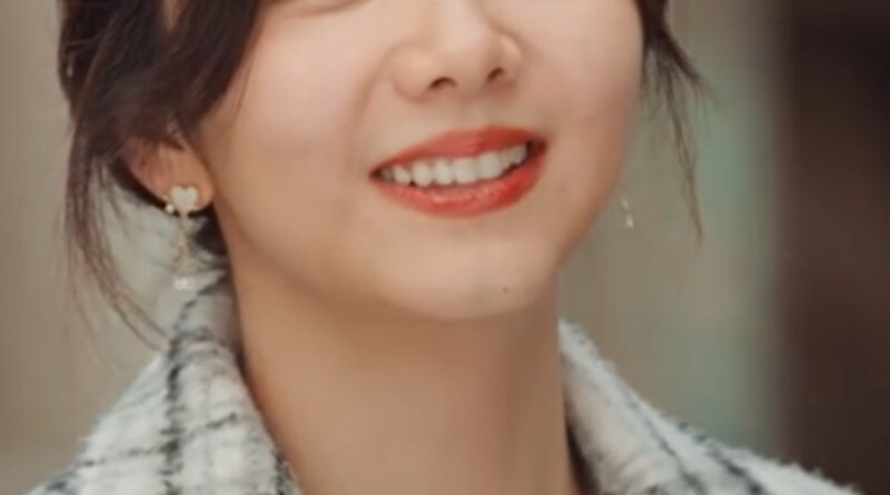 Scene from modern Chinese drama Road Home Episode 9 recap and review of a woman in a tweed coat