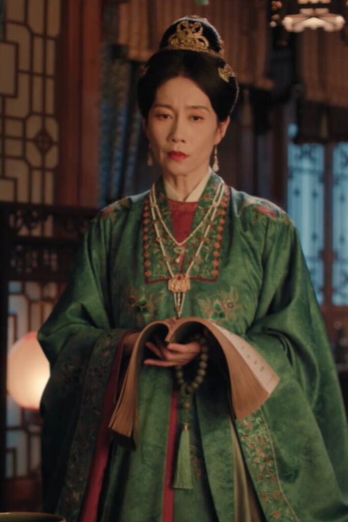 Scene from period Chinese drama The Road To Splendor Episode 30 recap and review of woman crying while reading book