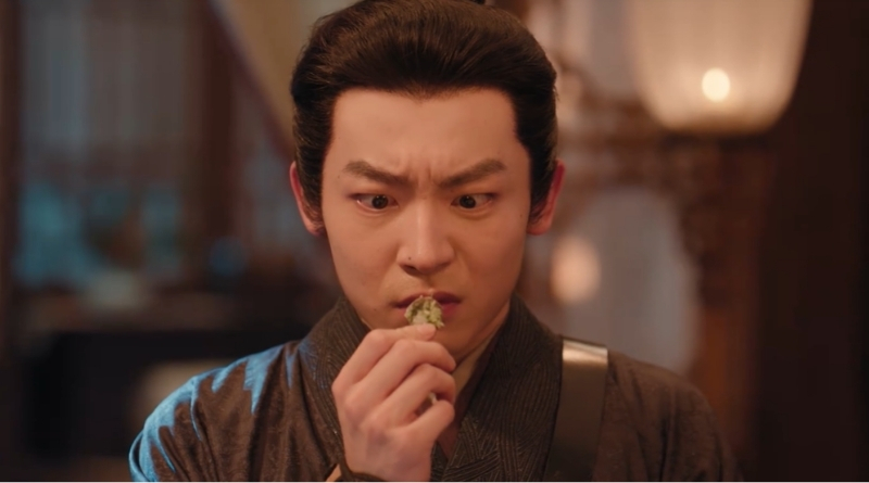 Scene from period Chinese drama The Road To Splendor Episode 32 recap and review of a man holding a coin he ate from a dumpling