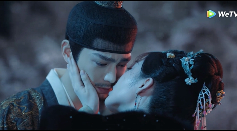 A scene from The Road To Splendor Romance Review and Recap (2026) of a woman cupping a man's face and kissing him