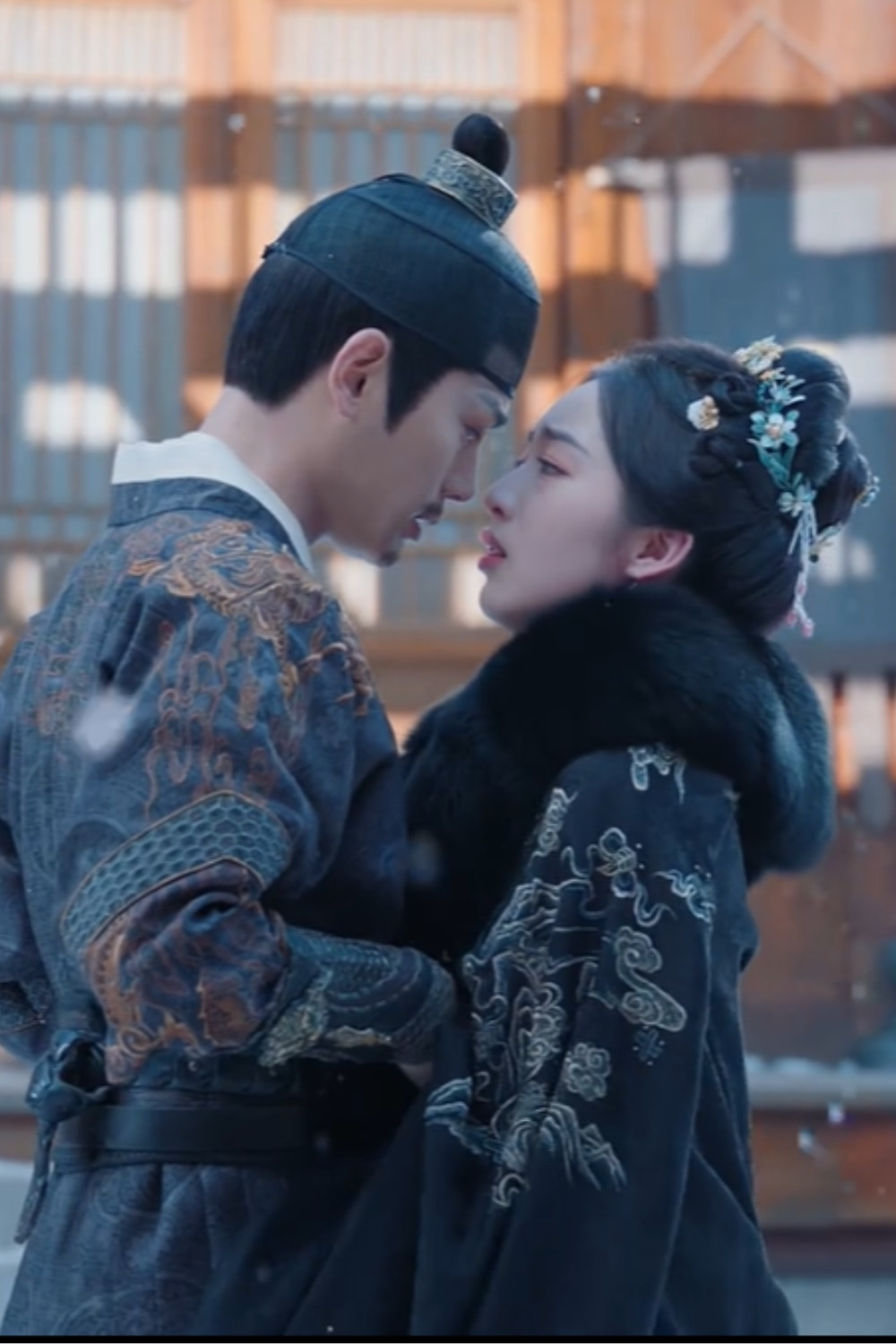 A scene from The Road To Splendor Romance Review and Recap (2026) of a man and woman holding each other close looking worried
