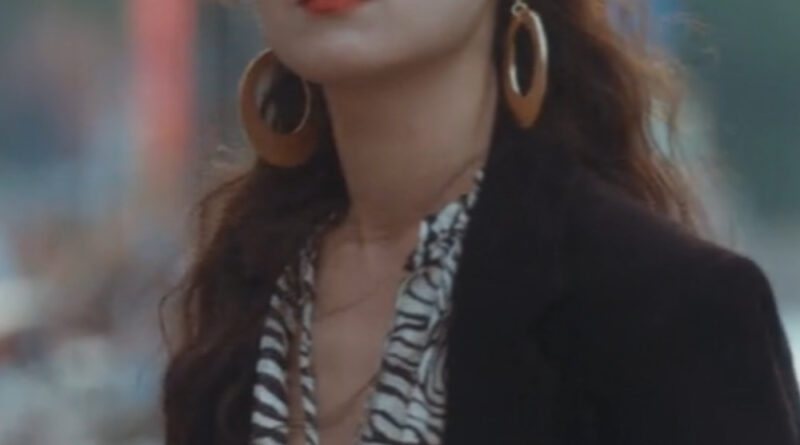 Scene from modern Chinese drama The Early Spring Episode 14 recap and review of a woman in sunglasses looking gangster
