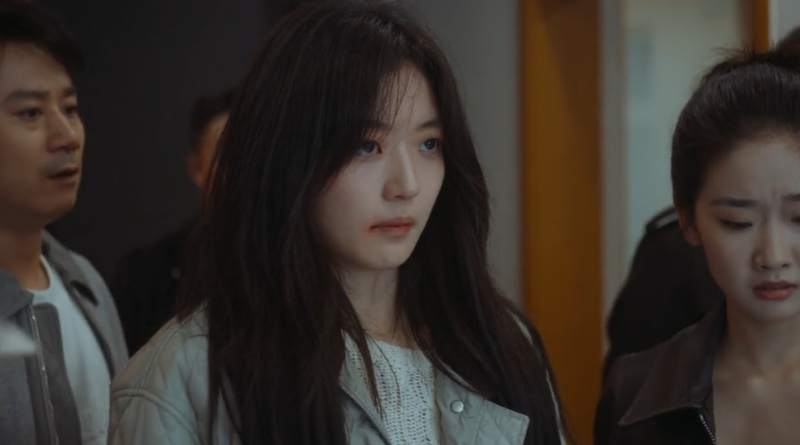 Scene from modern Chinese drama The Early Spring Episode 14 recap and review of a woman with a cut on her lip after a fight