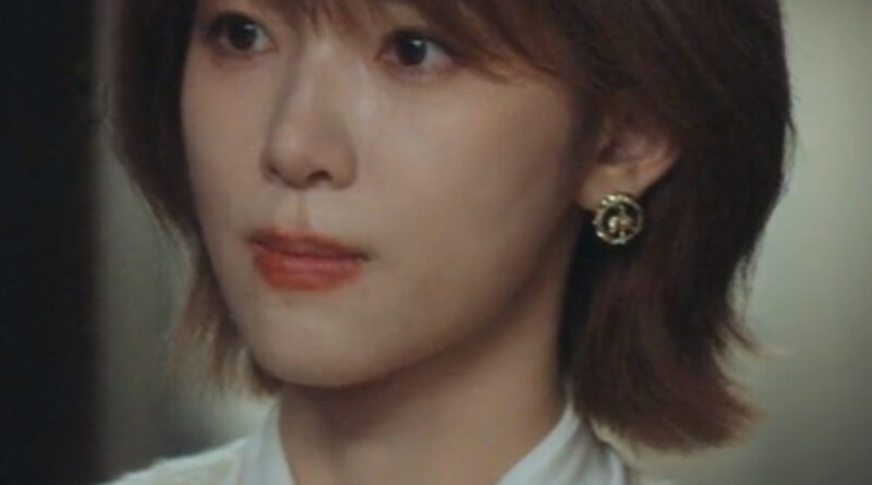 Scene from modern Chinese drama The Early Spring Episode 16 recap and review of a woman in a yellow jacket
