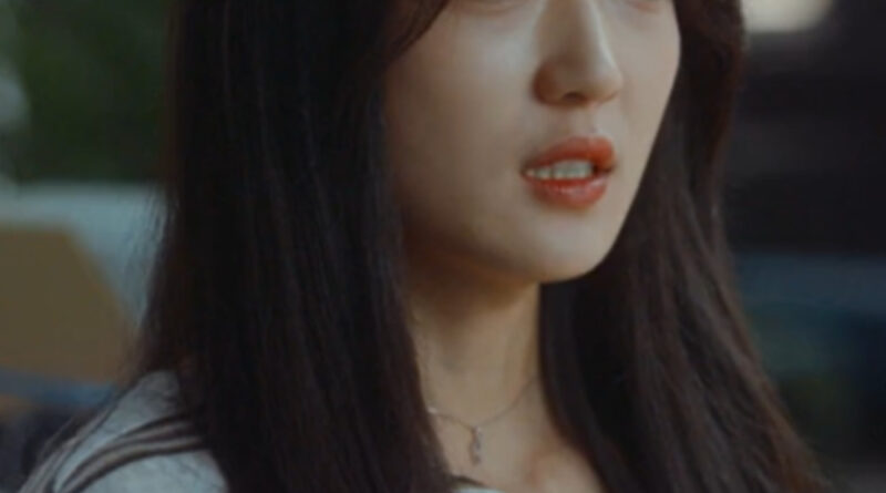 Scene from modern Chinese drama The Early Spring Episode 2 recap and review of a girl ins a striped tshirt with long hair