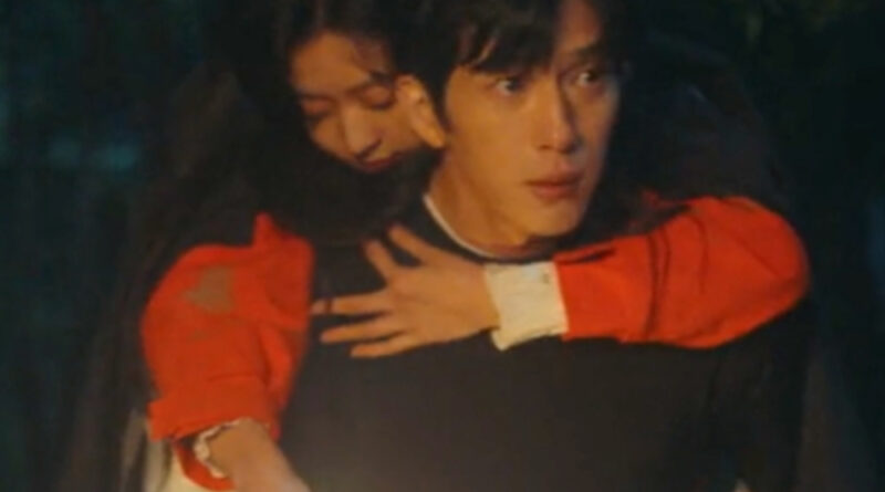 Scene from modern Chinese drama The Early Spring Episode 3 recap and review of a man piggybacking a woman in a red jacket down a mountain