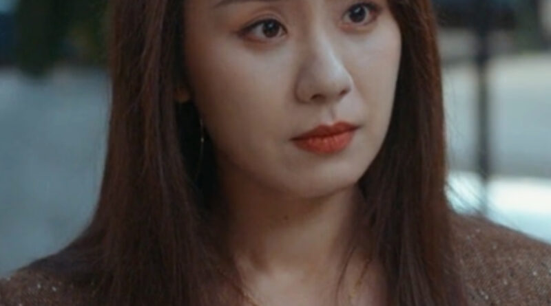 Scene from modern Chinese drama The Early Spring Episode 7 recap and review of a woman in a brown blazer and brown hair