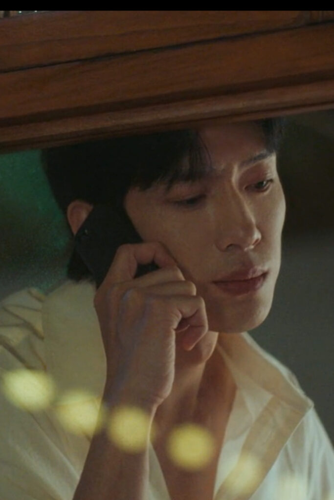 Scene from modern Chinese drama The Early Spring Episode 9 recap and review of a man on his phone