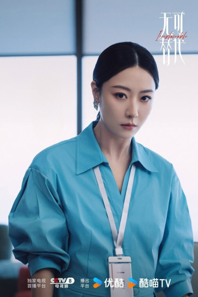 Scene from modern Chinese drama Irreplaceable (2026) Episode 4 Recap and review of a woman in a blue dress looking angry