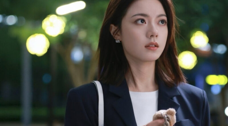 Scene from modern Chinese drama Irreplaceable (2026) Episode 9 Recap and review of a woman holding a bear charm looking surprised