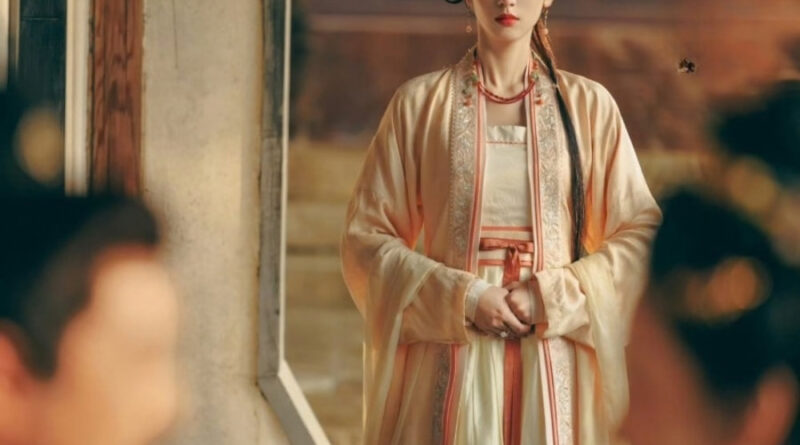 Scene from period Chinese drama Spring of The Blade (2026) Episode 10 Recap and review of a woman looking at a man who has his hand on his wife's cheek
