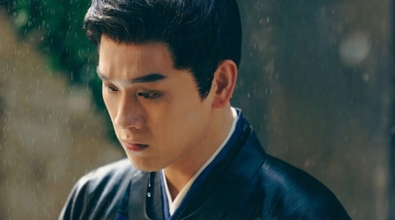 Scene from period Chinese drama Spring of The Blade (2026) Episode 17 Recap and review of a man in blue hanfu standing in the rain all wet