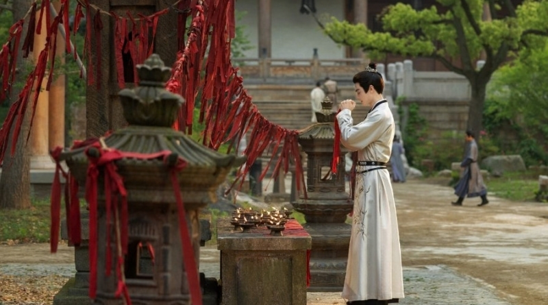 Scene from period Chinese drama Spring of The Blade (2026) Episode 17 Recap and review of a man making a wish in front of a wishing tree