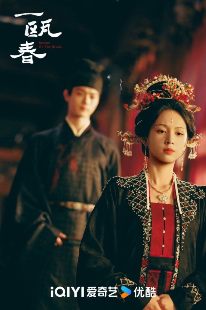 Scene from period Chinese drama Spring of The Blade (2026) Episode 2 Recap and review of a man looking at a woman kneeling in front of him