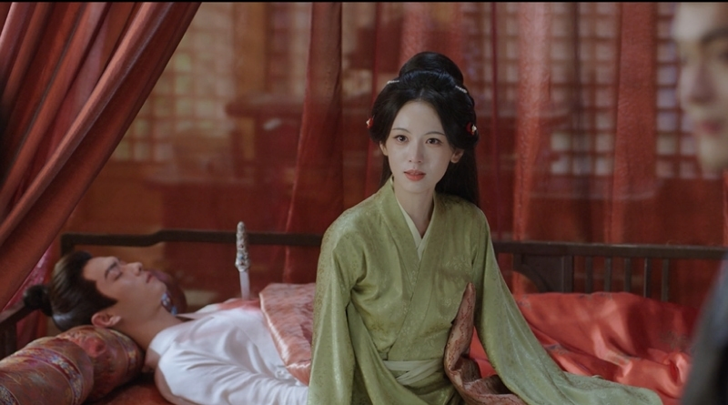 Scene from period Chinese drama Spring of The Blade (2026) Episode 25 Recap and review of a sad woman in bed with her husband dead behind her with a knife in his heart