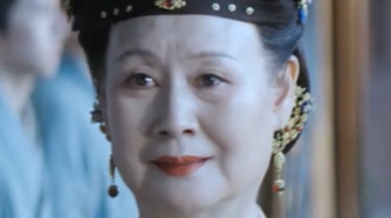 Scene from period Chinese drama Spring of The Blade (2026) Episode 28 Recap and review of an elderly lady in chinese hanfu and head gear