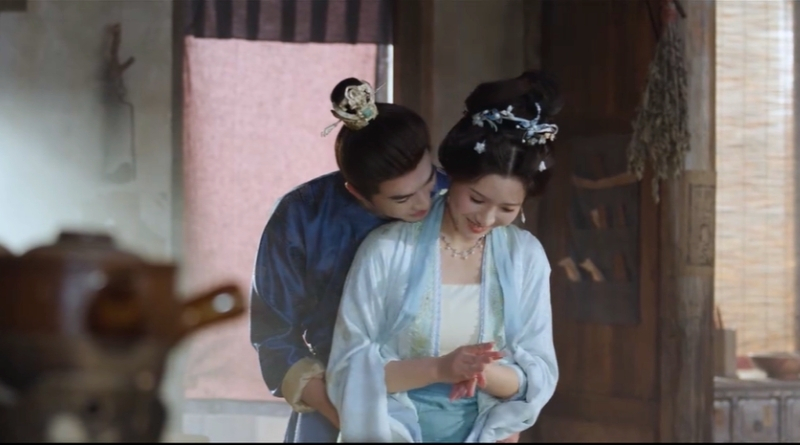Scene from period Chinese drama Spring of The Blade (2026) Episode 30 Recap and review of a happy couple making pastries in the kitchen