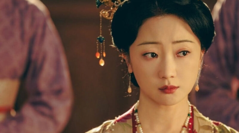 Scene from period Chinese drama Spring of The Blade (2026) Episode 7 Recap and review of a woman not looking happy in a red and gold hanfu