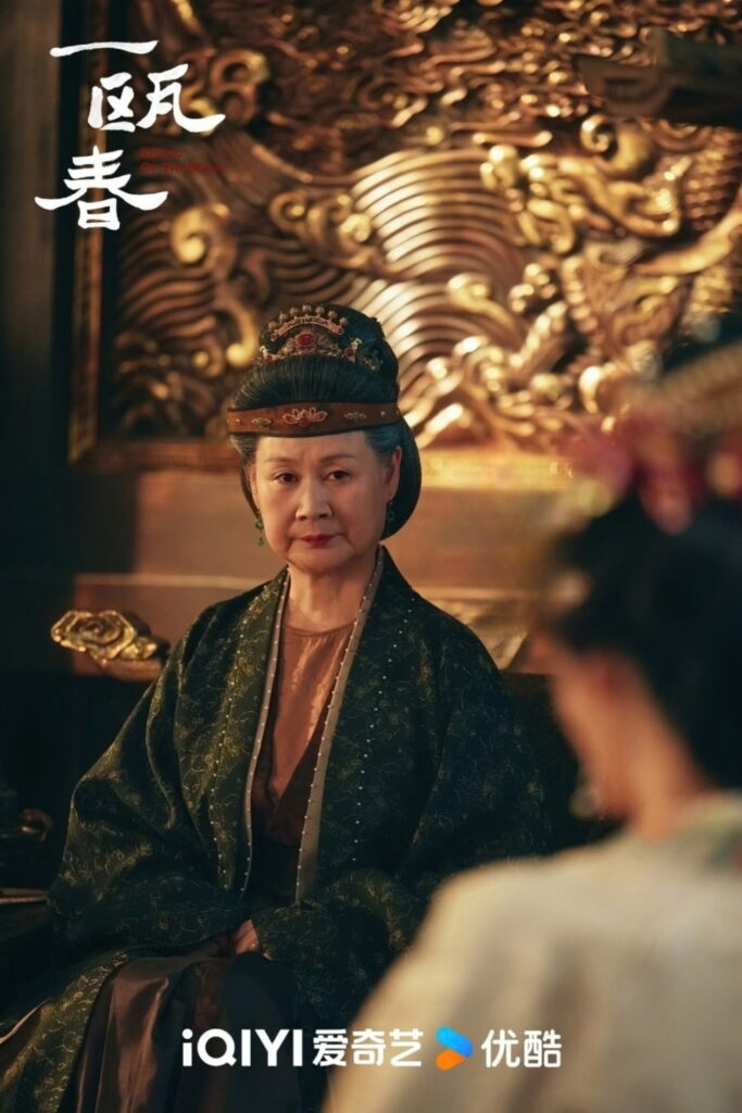 Scene from period Chinese drama Spring of The Blade (2026) Episode 9 Recap and review of an elderly lady sitting looking angry